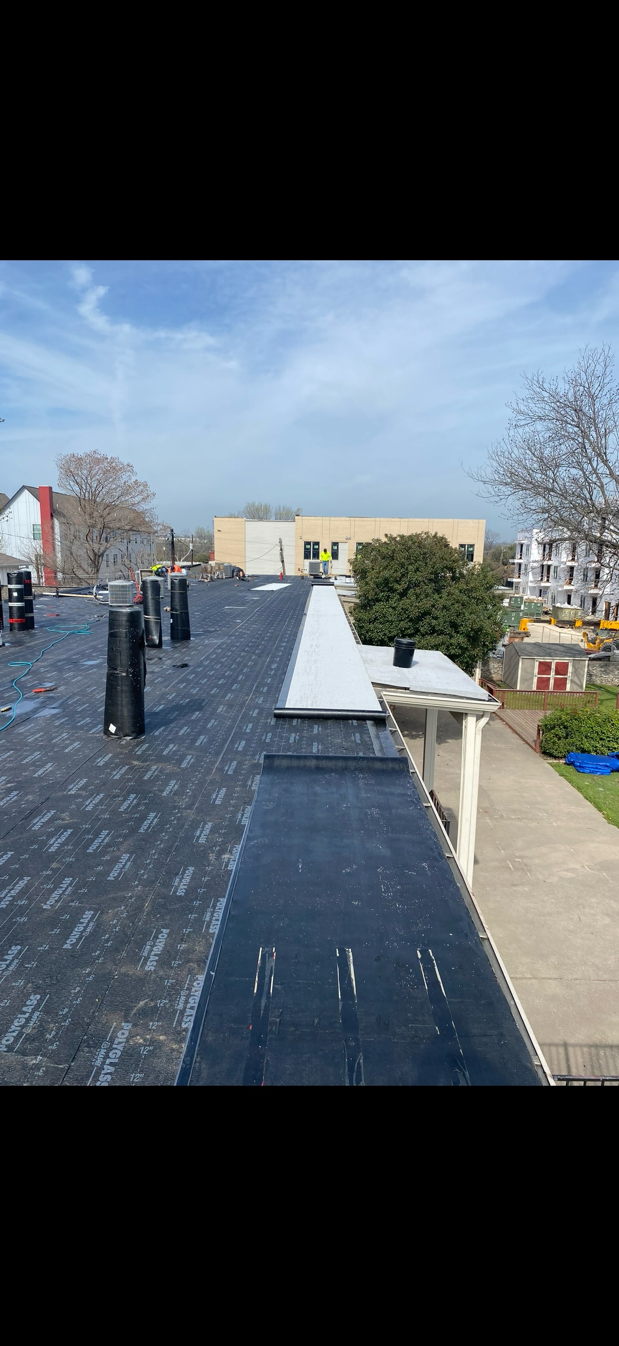 Commercial flat roof replacement and waterproofing project in Austin by PS Premier Construction