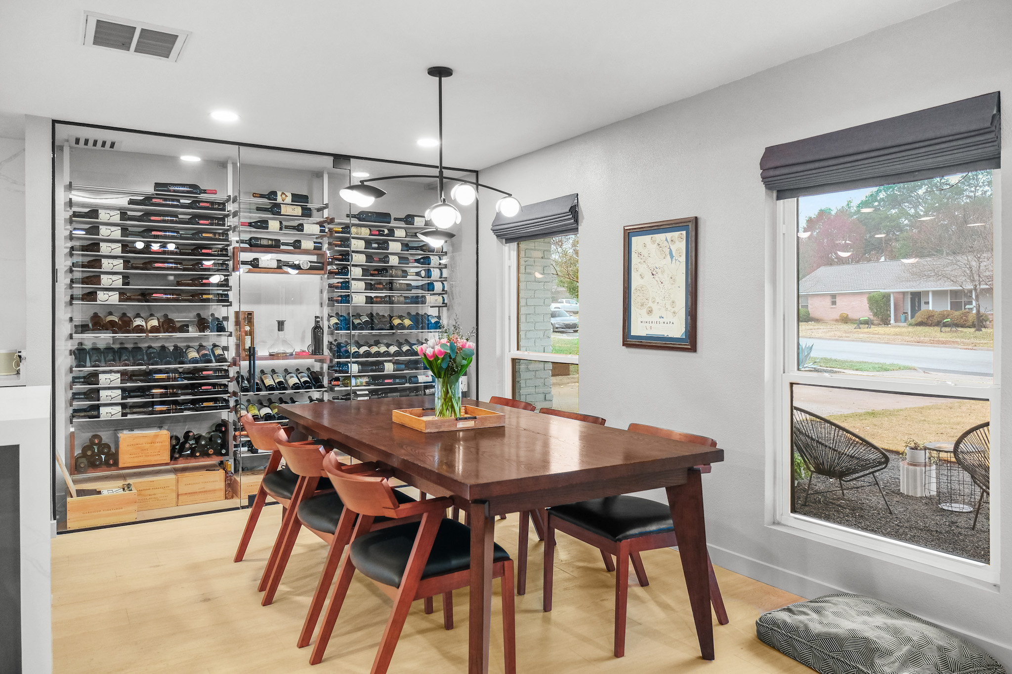Dining room with custom glass wine wall